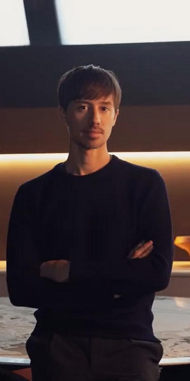 Federico Peri standing with crossed arms